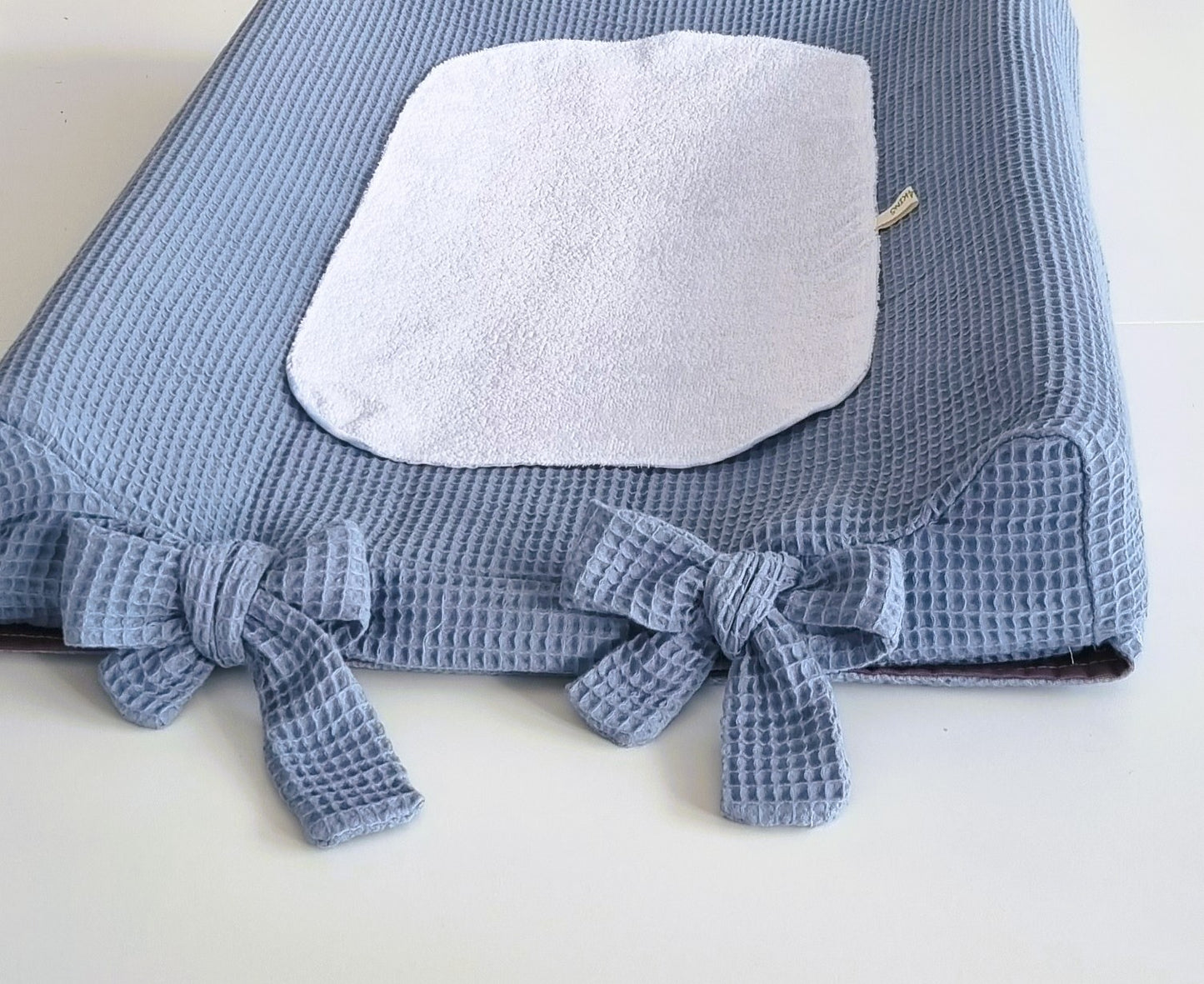 Υφασμάτινο κάλυμμα αλλαξιέρας The4kins σε διάσταση 70x50.