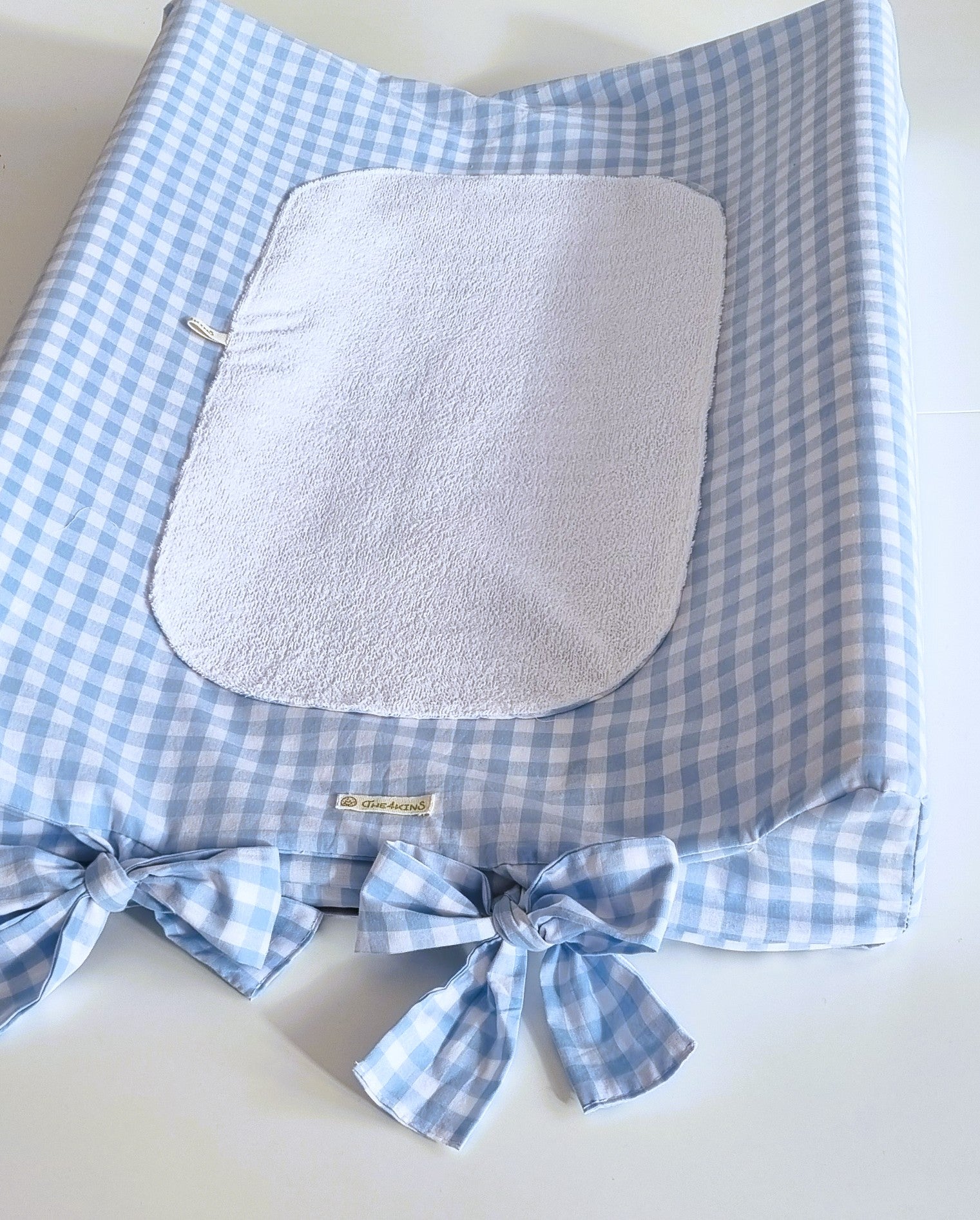 Υφασμάτινο κάλυμμα αλλαξιέρας The4kins σε διάσταση 70x50.