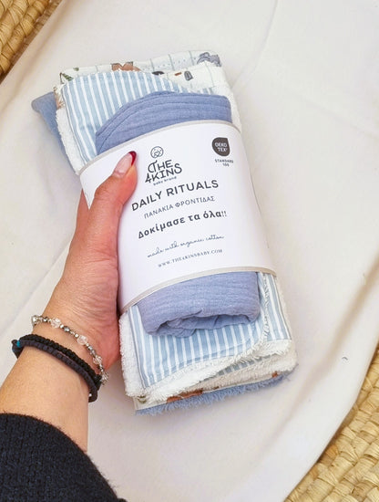 Σετ Daily Rituals με 5 βρεφικά πανάκια φροντίδας από λευκή οργανική μουσελίνα και βαμβακερή πετσέτα σε διάφορα μεγέθη.